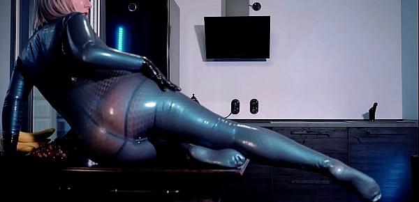  sexy curvy MILF Arya Grander fetish model posing in latex rubber catsuit